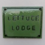 Lettuce Lodge Enamel Sign